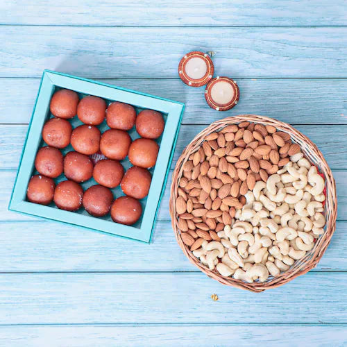 Diyas and sweets with dry fruits combo